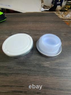 Case of 500 Tri-Sure Uni-Grip Pro-Blue lids with crimp on spout closures. NEW