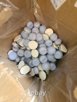 Case of 500 Tri-Sure Uni-Grip Pro-Blue lids with crimp on spout closures. NEW